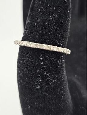 Elegant Sterling Silver Eternity Band Ring with Embedded Stones, Size 6.5